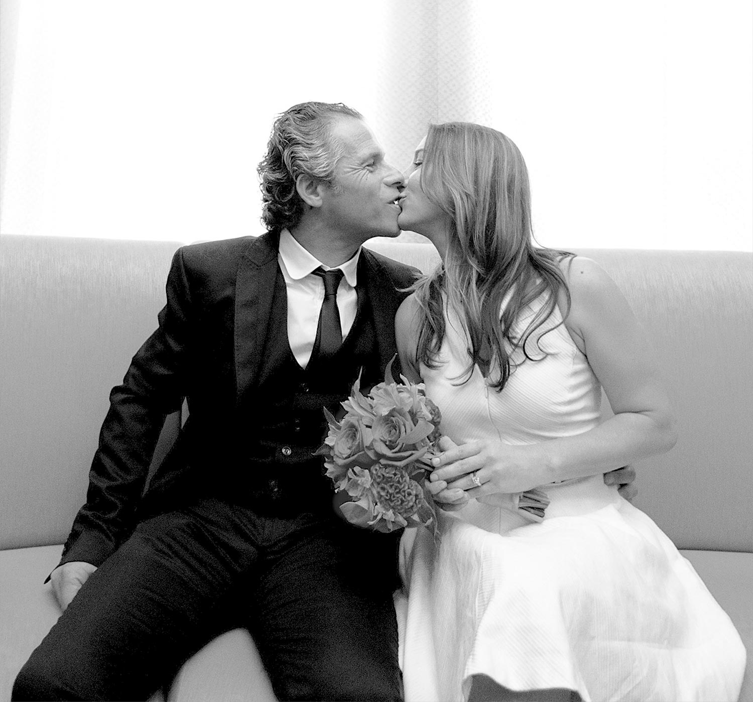 NYC-Groom-Luiz-kissing-at-NYC city hall wedding
