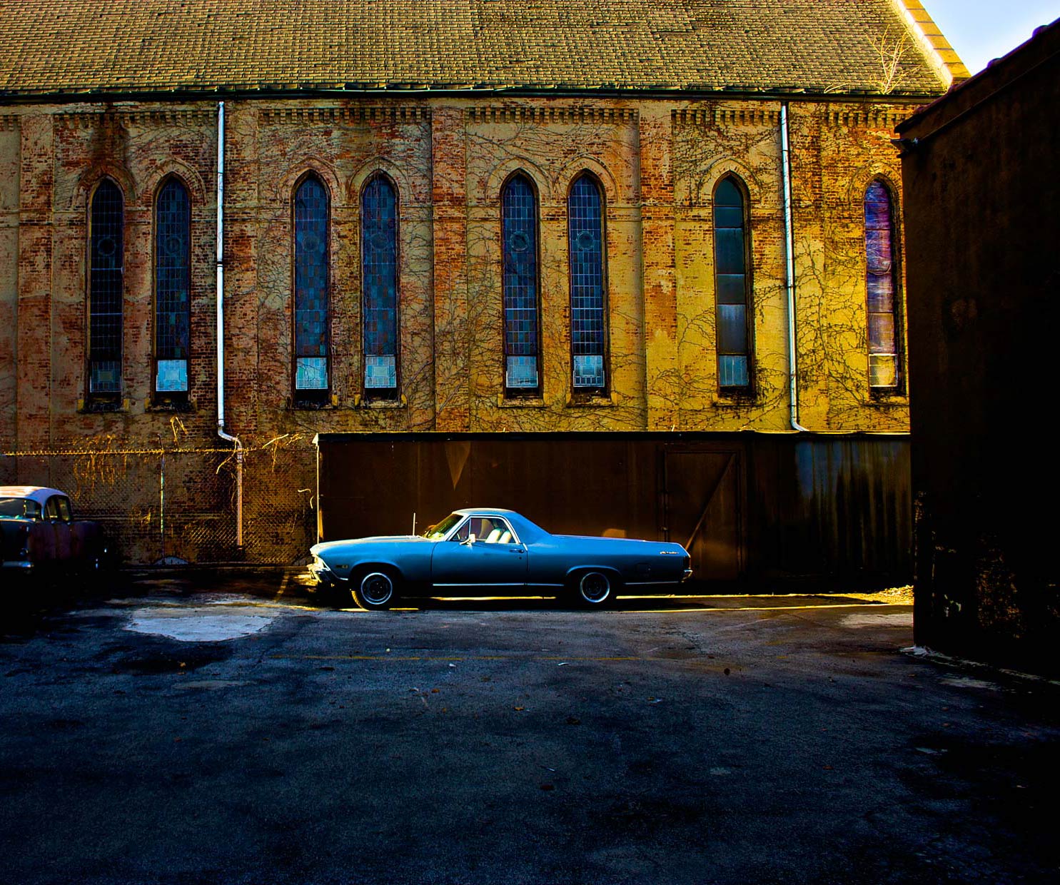 Old blue Chevy El Camino in Parking Lot of Red Hook Brooklyn Parking  Lot.
